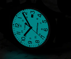 The Timex Indiglo lighting up a Timex Dial in the dark